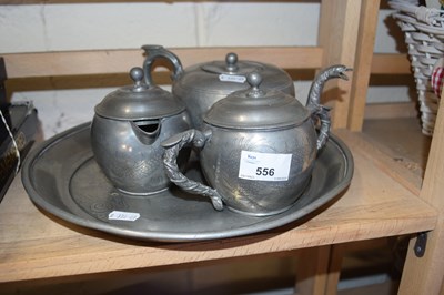 Lot 556 - Chinese pewter tea set marked to the base...