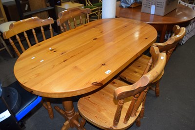 Lot 802 - Varnished pine kitchen table and  four...