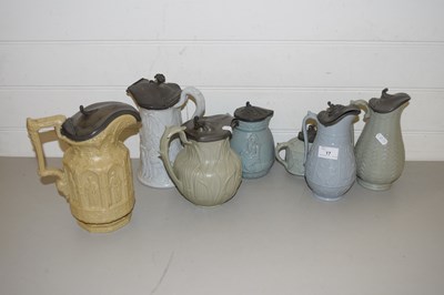 Lot 17 - COLLECTION OF SIX VICTORIAN PEWTER LIDDED JUGS...