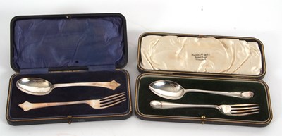 Lot 217 - Two  cased silver Christening spoon and fork...