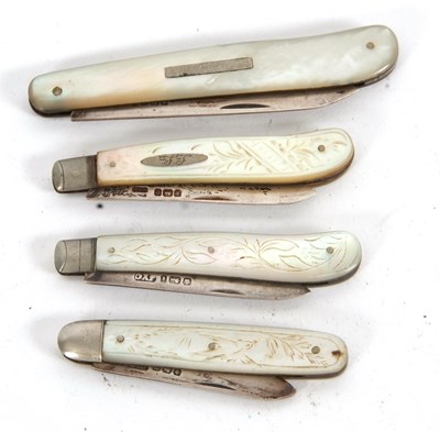 Lot 251 - Group of four mother of pearl handled silver...