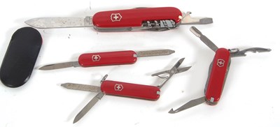 Lot 160 - Group of four various Swiss Army penknives,...