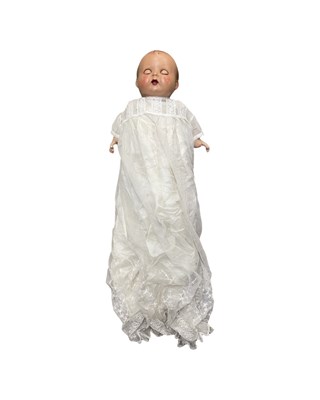 Lot 233 - A 1930s European composite doll with straw...