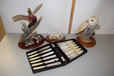 Lot 14 - Group of three modern porcelain animal models...