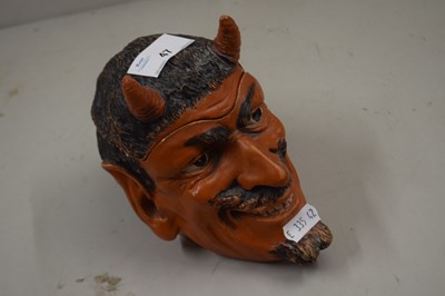 Lot 47 - Tobacco jar formed as the devils head