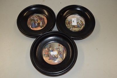 Lot 69 - Three vintage Pratt ware pot lids in ebonised...