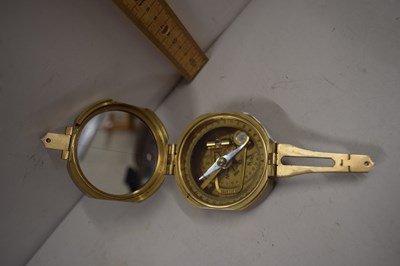 Lot 116 - Modern brass cased  compass marked natural sine