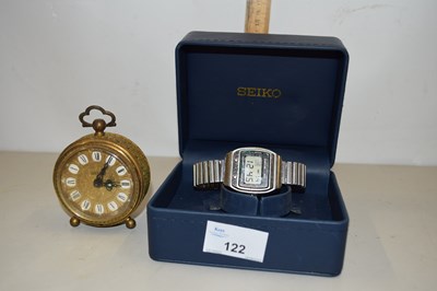 Lot 122 - Vintage Seiko digital watch and a small brass...