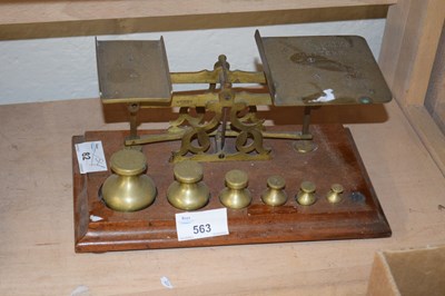 Lot 563 - Pair of brass scales and weights