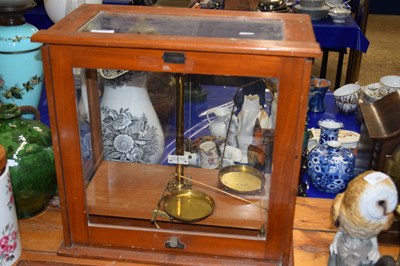 Lot 220 - Chemists beam scales set in a glass case