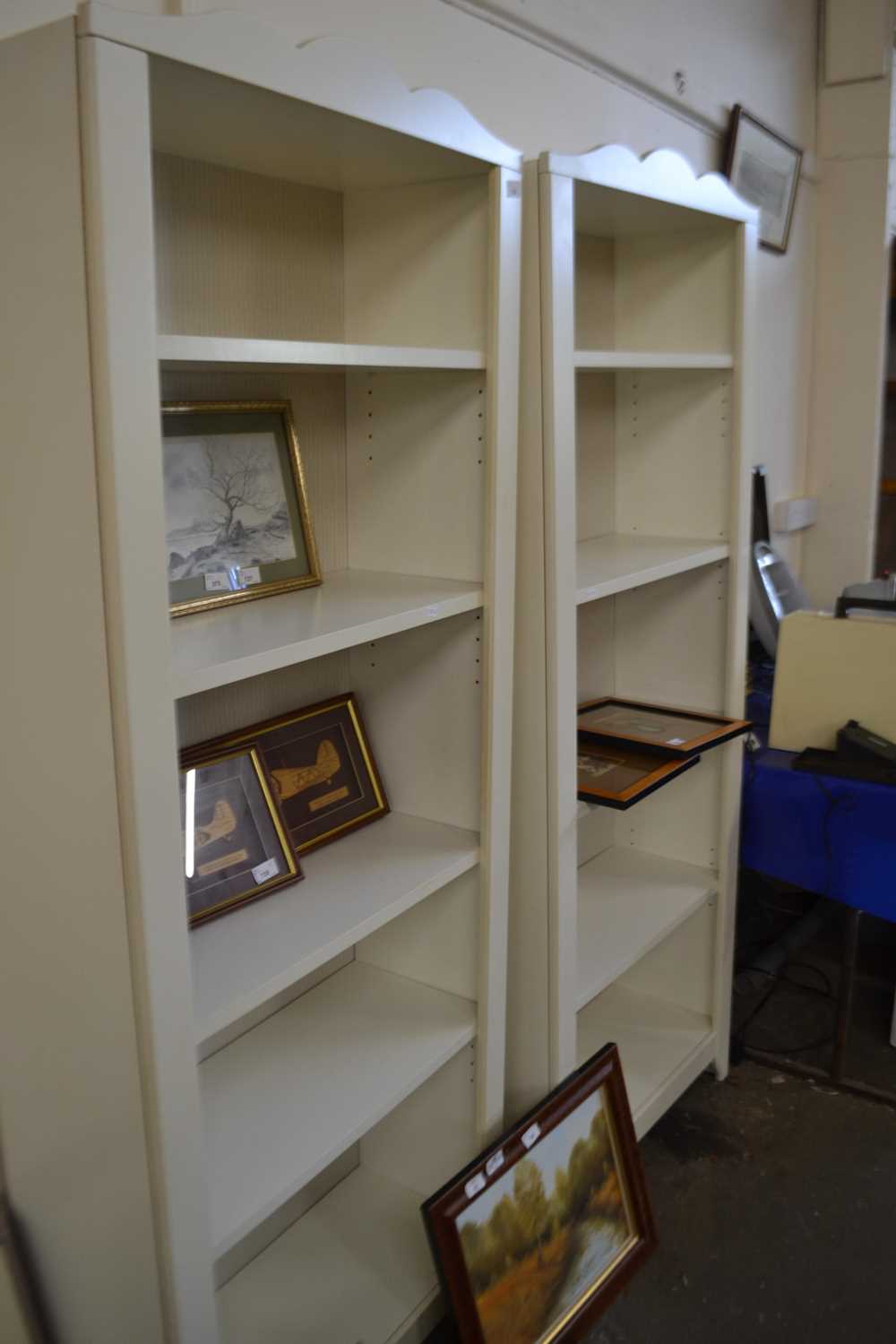 Lot 726 - Pair of cream freestanding bookcases