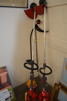 Lot 757 - Three petrol strimmers