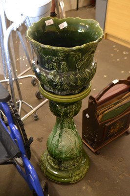 Lot 792 - Green glazed jardiniere on stand