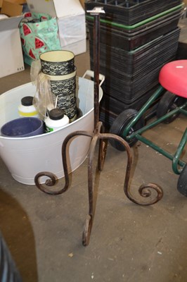 Lot 805 - Wrought iron four footed stand