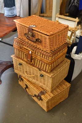 Lot 866 - Four various size wicker hampers