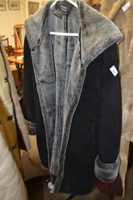 Lot 869 - Dennis Baso leather and faux fur lined hooded...