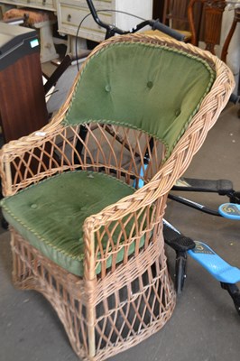 Lot 886 - Wicker chair with green upholstery