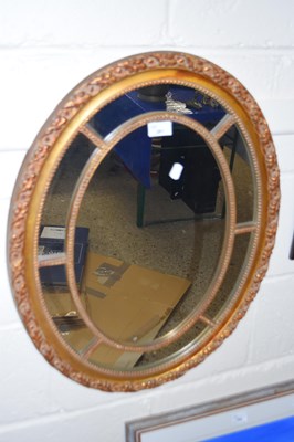 Lot 281 - 20th Century oval wall mirror in gilt finish...