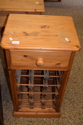 Lot 333 - Modern pine wine storage cabinet