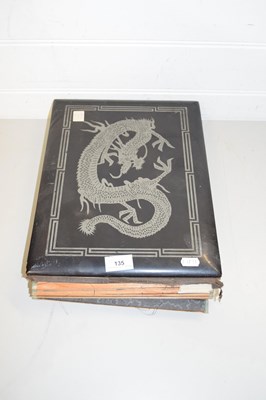 Lot 135 - BLACK LACQUERED ALBUM CONTAINING A RANGE OF...