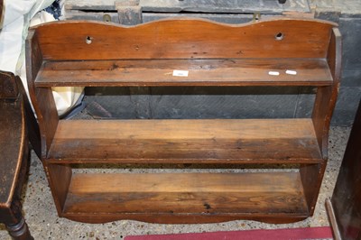 Lot 352 - Stained pine wall shelf, 79cm wide