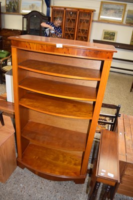 Lot 360 - Yew wood veneered bow front bookcase cabinet,...