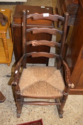 Lot 374 - Rush seated child's rocking chair