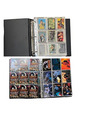 Lot 500 - Two binders containing various trading cards,...