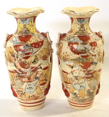 Lot 312 - A pair of Satsuma type vases decorated with...