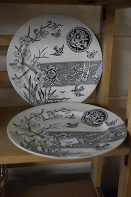 Lot 568 - Two black and white patterned dinner plates