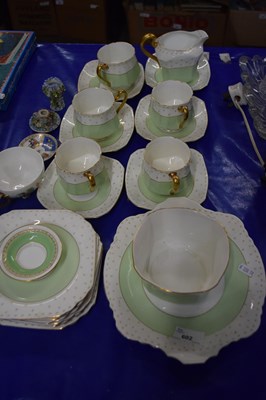 Lot 602 - Quantity of cream, green and gilt decorated...