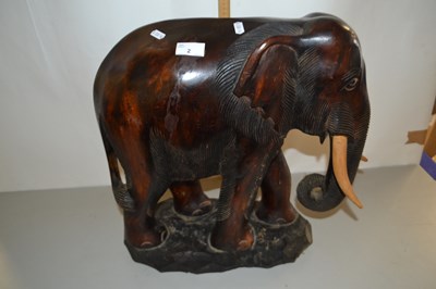 Lot 2 - Large wooden carved elephant on rectangular base