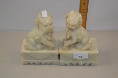 Lot 72 - Pair of soapstone dragons on rectangular bases