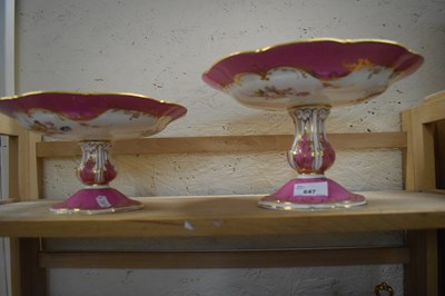 Lot 647 - Two pink and gilt glazed and floral decorated...