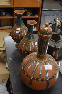 Lot 659 - Three terracotta and polychrome glazed vases