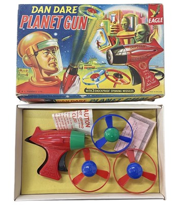 Lot 317 - A Dan Dare Planet Gun toy in original box with...