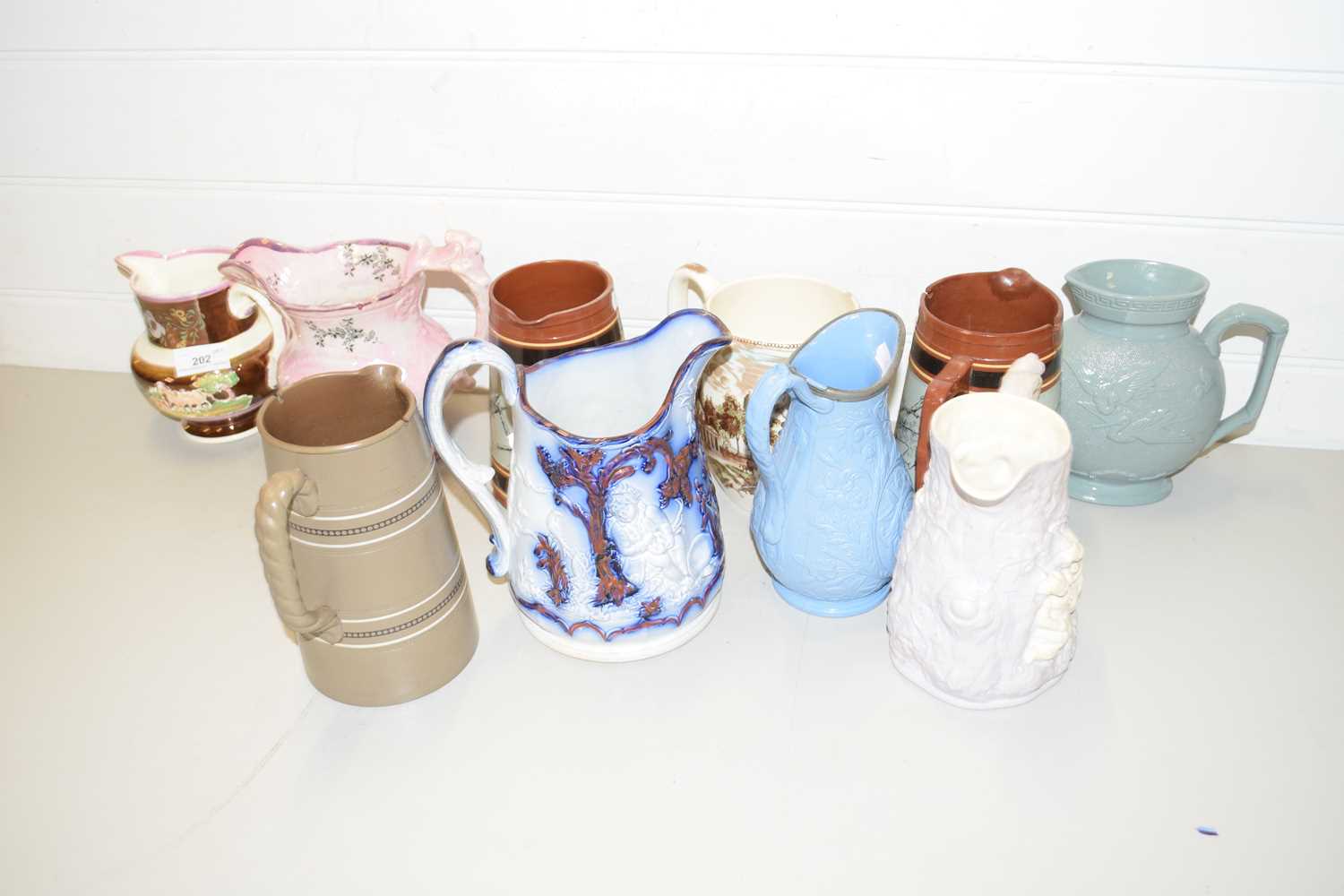 Lot 202 - VARIOUS VICTORIAN AND LATER DECORATED JUGS