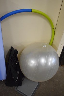 Lot 709 - An exercise ball, weighted hula hoop and a...