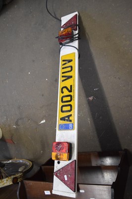 Lot 821 - A number plate board and lights for a trailer