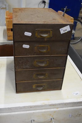 Lot 826 - A table top five drawer metal filing cabinet