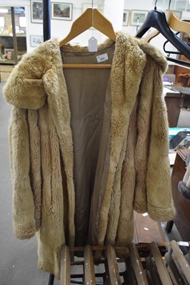 Lot 835 - Lady's camel coloured fur coat