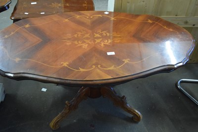 Lot 844 - An oval inlaid coffee table