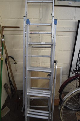 Lot 857 - Two extending aluminium ladders