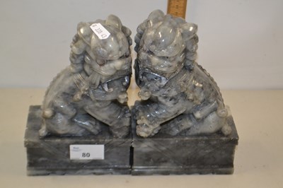 Lot 80 - Pair of soap stone carved dogs of fo