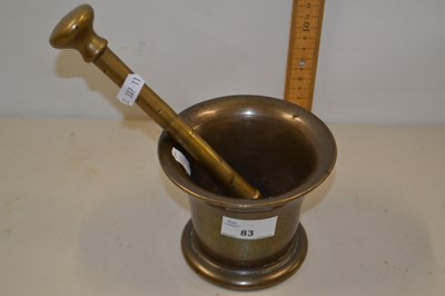 Lot 83 - Brass pestle and mortar