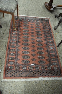 Lot 427 - Pink ground rug