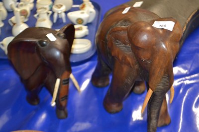 Lot 165 - Pair of carved wooden elephants