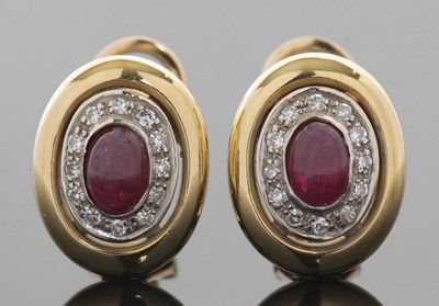Lot 380 - A pair of ruby and diamond earrings, the...