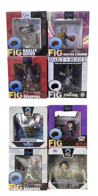 Lot 432 - A collection of Q Fig boxed vinyl figures:...