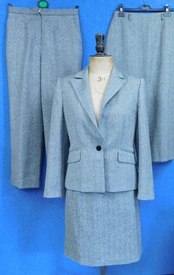 Lot 59 - A lady's suit by Artigiano; the herring bone...
